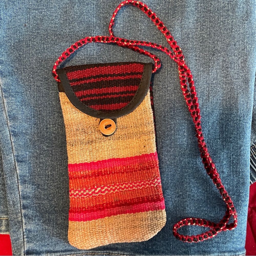 Boho woven bag from Peru with 12” cord button closure and colorful design NWOT